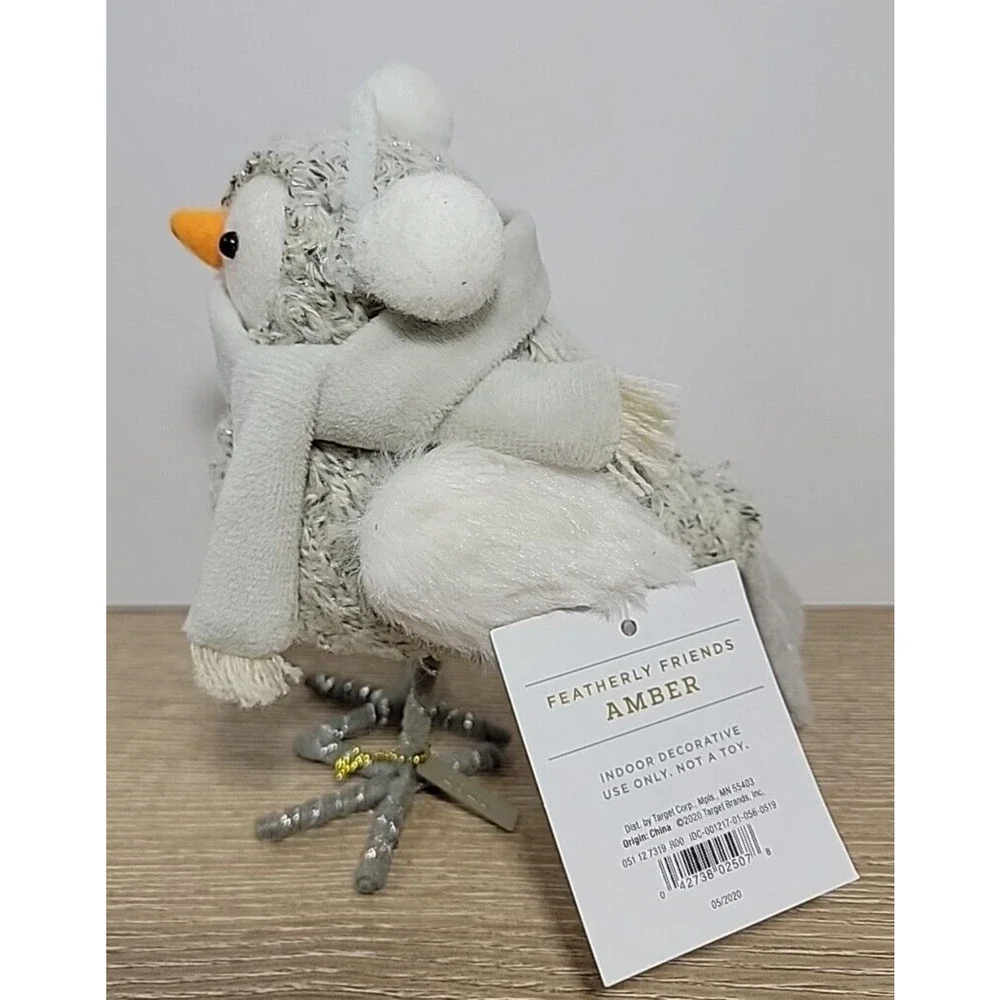 Wonder shop Target 2020 - Amber‎ our feathery friend wearing muffs & scarf